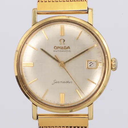Armbandsur Omega Seamaster, automatisk, Ø34mm, guld på stål, datum, repigt glas, armband i gulmetall ej original