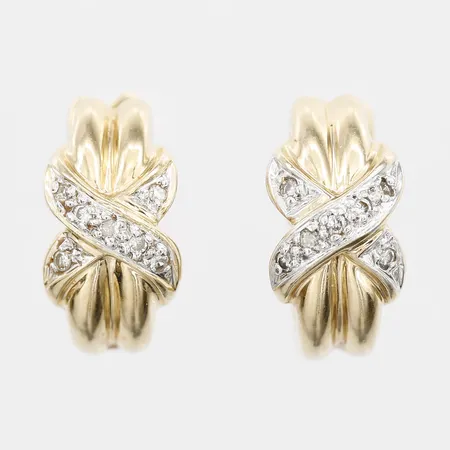 Ett par örhängen med 14 x ca 0,01ct, höjd 15mm, bredd 8mm, 14K guld Vikt: 7,5 g