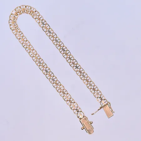 Armband X-länk längd 19 cm, bredd 5 mm 18K. Vikt: 6,1 g