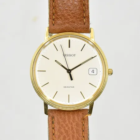 Herrur Tissot Seastar 18K boett Ø34mm datum quartz, gravyr på boett, brunt läderband ej original Vikt: 0 g