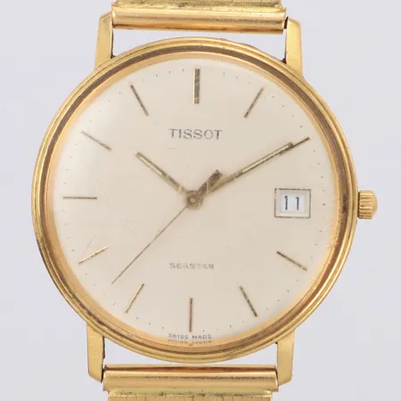 Armbandsur Tissot Seastar 18K, quartz, Ø34mm, datum, guldarmband, plexiglas repigt, gravyr, går ej, bruttovikt 77,8g