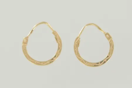 Ett par örhängen diam 1 cm 18K Vikt: 0,9 g