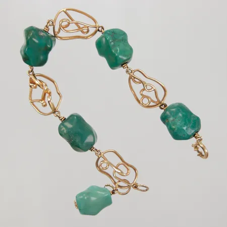 Armband med turkoser ca 17,5cm bredd ca 10,4-16mm, Sellen Lars-Ola Guldsmed år 1967, 18K, Bruttovikt: 37g.