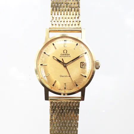 Herrur Omega Automatic diameter ca 34.4 mm,tickar igång men ej funktionstestat,någon repa,14k i uret och 18k i armbandet,totalvikt 71.4 gram.