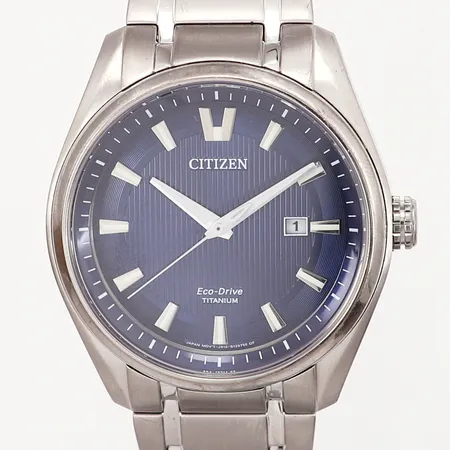 Herrur Citizen EcoDrive Titanium Ø42mm Quartz, stålarmband, datumfönster ref: J810 - S088087, inre omkrets ca.18cm, ingra övriga tillbehör.