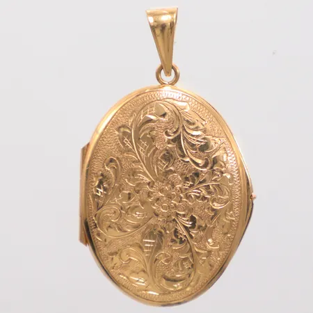 Medaljong med fotogömma längd 4cm bredd 2,3cm, 18k Vikt: 7,1 g