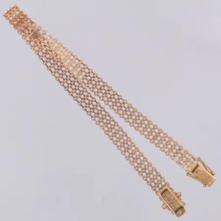 Armband X-länk Svedbom år 1991 18,5cm bredd 6mm, 18K Vikt: 5,9 g