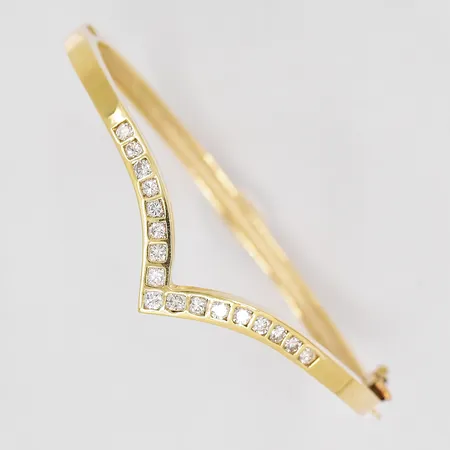 Armring diamanter ca 17x0,03ct bredd 3,9mm 14K Vikt: 16,7 g