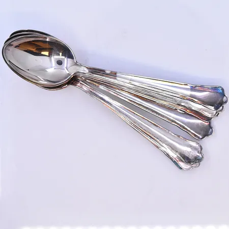 8 skedar modell Chippendale längd 12 cm, silver 830/1000. Vikt: 118,2 g