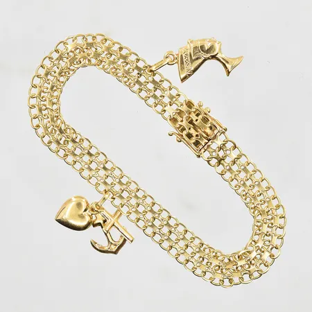 Armband X-länk med 2 berlocker längd 18½ cm, bredd 8 mm, 18K. Vikt: 12,1 g