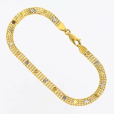 Armband ca18,5cm, bredd ca 5mm, skevheter, 21K  Vikt: 6,3 g