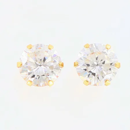 Ett par örhängen med vita stenar, ca 7mm, 18K Vikt: 1,2 g