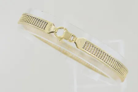 Armband i set längd 17,5 cm bredd 4,9 mm ojämn 18K Vikt: 7,8 g