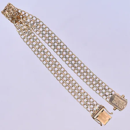 Armband X-länk längd 20,5 cm, bredd 8 mm 18K. Vikt: 11,7 g