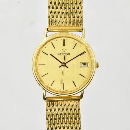 Herrur Eterna 18K quartz datum boett Ø33mm, gravyr på boett, defekt länk i doublé/metall.