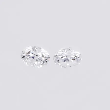 Lösa diamanter ca 2 x 0,09ct TW-W/VS-Si  Vikt: 0 g