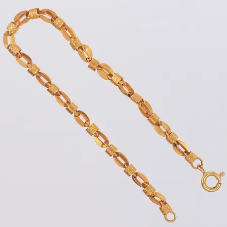 Armband, längd 21cm, bredd 6mm, ojämnheter, bucklor, 21K Vikt: 8,9 g