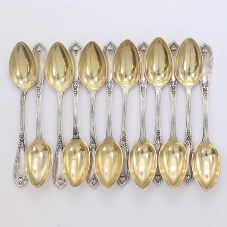 12 Kaffeskedar längd 11cm förgyllda blad, 830/1000 silver Vikt: 179,2 g