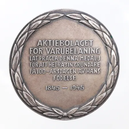 Medalj Aktiebolaget för Varubelåning.Sporrong & Co Stockholm 1945,diameter ca 55 mm,silver 830/1000. Vikt: 92,5 g