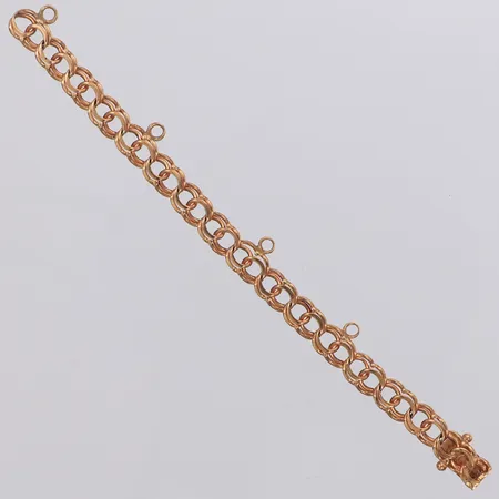 Länkdel till armband Bismarck längd, 10,5cm, bredd 5,5mm, fyra öglor till berlocker, saknar lås, år 1960, 18K Vikt: 4,1 g