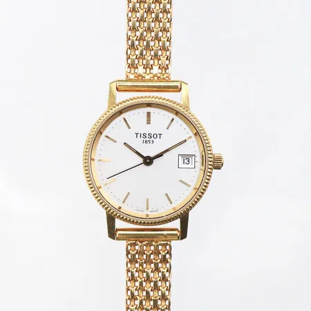 Damur Tissot,diameter ca 24 mm,fungerar ej,18k i ur och band,totalvikt 23.3 gram.