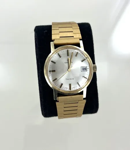 Herrur Omega manuell 136070 inre boett 32182880 diam 34,5 mm, boett 14K armbandet i metall repor på glaset bv 69 gr