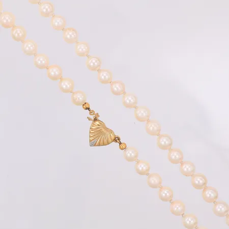 Pärlcollier 49cm med guldlås bredd: ca 6,5mm, odlade saltvattenpärlor, lås 8K ca 1,2g.