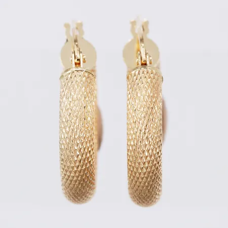 Ett par örhängen creoler Ø ca 11mm bredd: ca 4mm 18K Vikt: 2,5 g