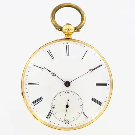 Fickur med nyckel, graverad insida boett, caØ44mm, plastglas, sekundvisare, bruttovikt: 53,1gram, boett samt innerboett 18K