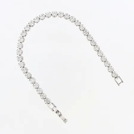 Armband med vita stenar, ca 17,5cm, bredd ca 5mm, 925/1000 Silver Vikt: 12,9 g