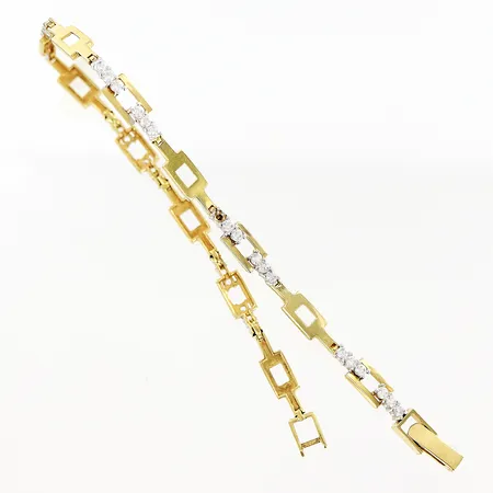 Armband med vita stenar längd 19cm, bredd 2-4mm, 1 sten saknas, lås i behov av justering, 18K  Vikt: 7,2 g