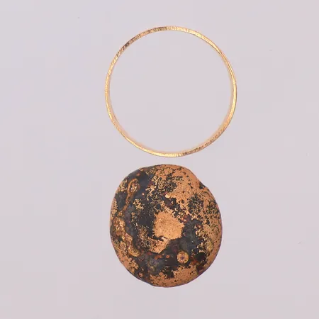 2 guld bitar 18K Vikt: 4,8 g
