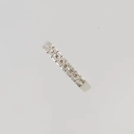 Ring med diamanter 7x ca 0,02ct stl:19½ bredd 3mm 18K 4,2g.