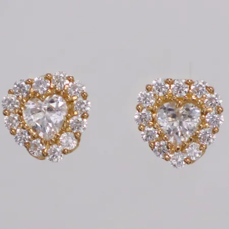 Ett par örhängen hjärtan vita stenar längd 7mm, ett stopp saknas, 14K  Vikt: 1,1 g