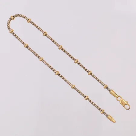 Armband med kulor längd 18,5cm bredd 1,5-3mm, tvåfärgad, 18K Vikt: 3,1 g