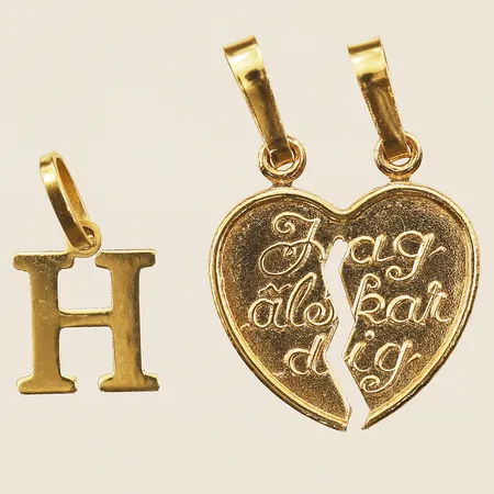 Diverse guld, två hängen 18K Vikt: 1,3 g