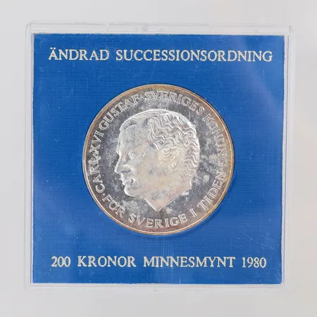 Minnesmynt Carl XVI Gustaf ändrad successionsordning 1980, nominellt värde 200kr, etui, silver 925/1000 Vikt: 27,1 g