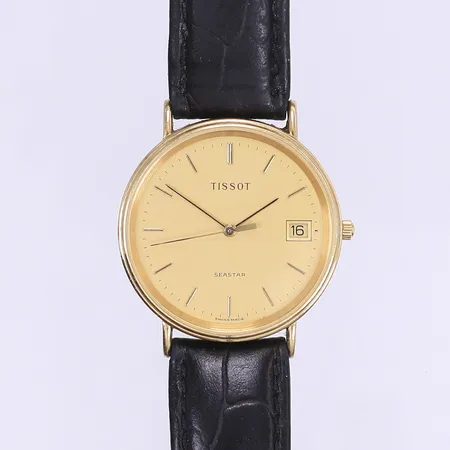 Herrur Tissot Seastar, Ø33,5mm, quartz, datum, boett 14K, läderband ej original, smärre bruksslitage, fungerande vid katalogisering, inga tillbehör