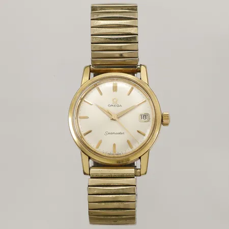 Herrur Omega Seamaster guld på stål automat ref-nr:136.005 serie-nr:21121903 kaliber:610 Ø33mm flexilänk i gulmetall/stål årtal ca 1964 bruksskick inga tillbehör