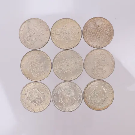 9 mynt Gustaf VI Adolf 1954-1966, nominellt värde 2kr, silver 400/1000 Vikt: 125,9 g