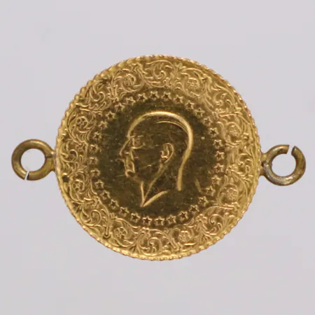 Mynt Attaturk år 2017 Ø18mm, två öglor ej i guld, 21,6K  Vikt: 1,8 g