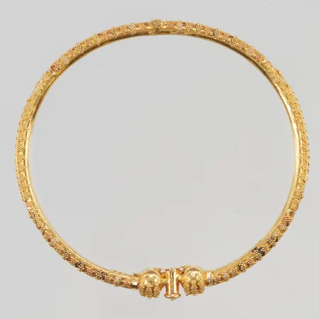 Armring öppningsbar 61x53mm bredd 4-7mm 21K 12,4g.
