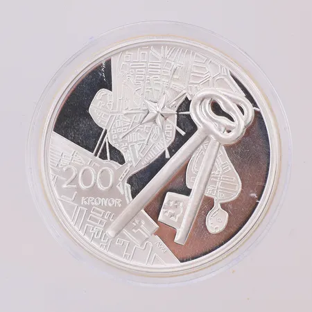 Minnesmynt Stockholms Slott 250 år 1754-2004, nominellt värde 200kr, etui Sveriges Riksbank, informationsblad, silver 925/1000 Vikt: 27 g