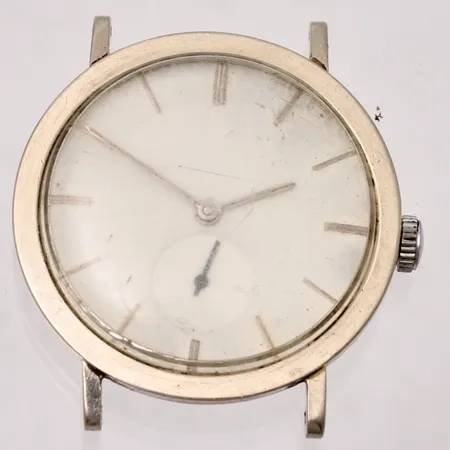 Armbandsur Longines i 14K vitguld, manuell, Ø33mm, ref: 23c, serie:nr 9477761, boett:nr 292079 175, defekt, går ej att vrida upp, personlig gravyr.