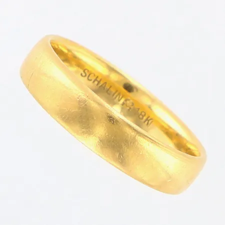 Ring slät Schalins stl:19, bredd ca 5mm, 18K Vikt: 6,2 g