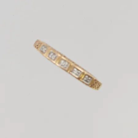 Ring med diamanter 5x ca 0,0025ct stl:19 bredd 3mm 18K 1,6g.