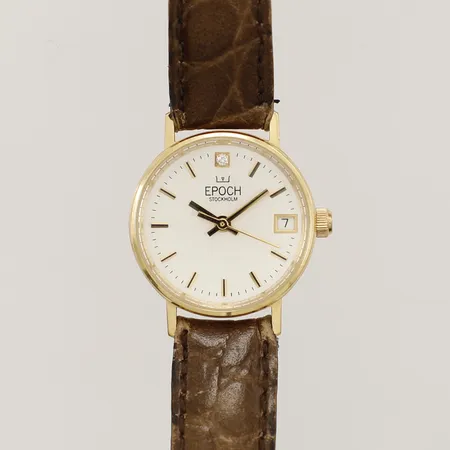 Damur Epoch Stockholm med diamant 0,01ct guld quartz med läderband 23cm gravyr batteribyte krävs 18K  Vikt: 0 g