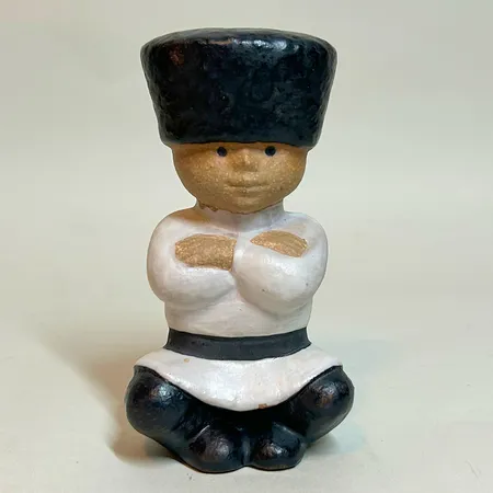 Figurin "Ivan" Lisa Larson för Rörstrand, ur serien All världens barn, höjd 12,5cm, svaga stämplar, stengods 
