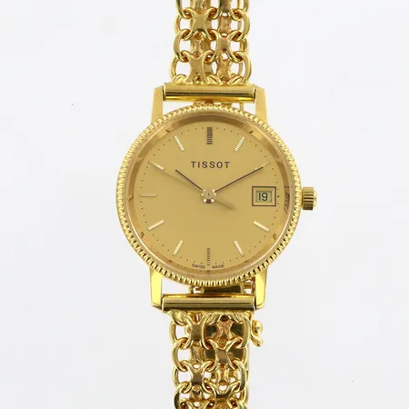 Damur Tissot i 18K, quartz, Ø24mm, datum, integrerad X-länk i 18K, innermått ca 18,5cm, batteribyte behövs, bruttovikt: 23,4g