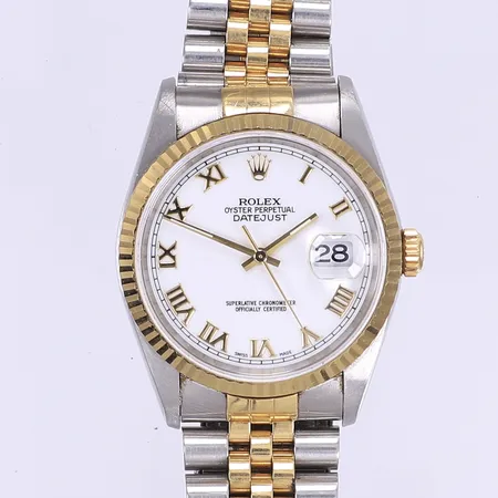 Herrur Oyster Perpetual Datejust Ø36mm, automat, datum, guld/stål, ref 16233, serienummer T929838, vit urtavla med romerska index, jubilee-länk ca 17cm guld/stål ref 62523H-18/455B, mindre repor på boett, repig något slapp jubilee-länk, box, ytterkartong, certifikat och kvitto från Barrys Jewellers Leeds 1999, två broschyrer samt översättningsbroschyr